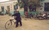 42 Rural man wearing Chinese hat